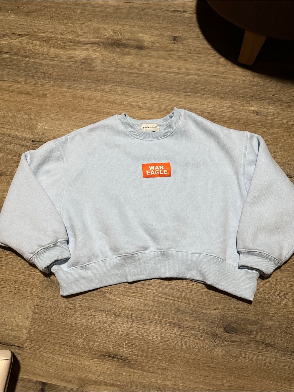 Scarlet and gold Light Blue Crewneck Sweatshirt with Orange WAR EAGLE Logo